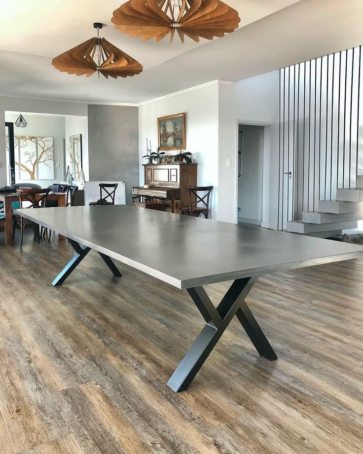 Atlas architectural GFRC concrete dining table by KATACHI Studio.
