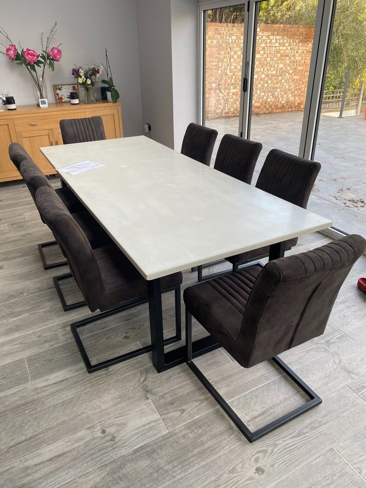 Atlas architectural GFRC concrete dining table by KATACHI Studio.